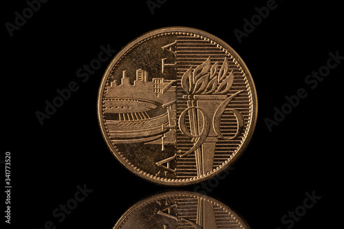 Atlanta 1996 olympics commemorative coin isolated on black