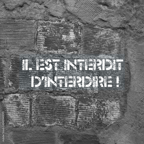 Wall with the French 1968 slogan "il est interdit d'interdire", meaning: "It is forbidden to forbid"