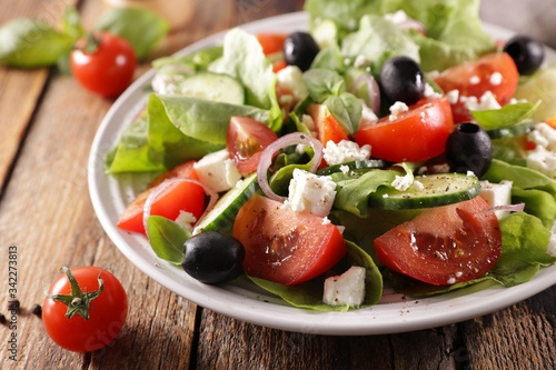 vegetable salad with tomato, cucumber, cheese and olive