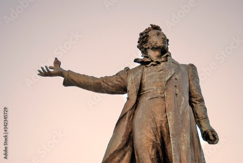 Statue of Alexander Pushkin, Russian poet and writer, in Saint-Petersburg, Russia. Color photo.