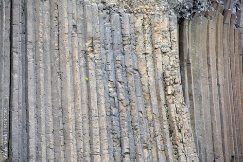 Iceland - August 29, 2017: Basaltic columns details of Litlanesfoss waterfall, Iceland, Europe