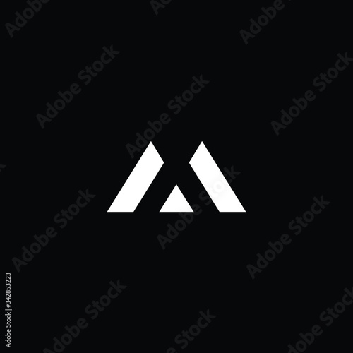 Minimal elegant monogram art logo. Outstanding professional trendy awesome artistic M MX XM MA AM initial based Alphabet icon logo. Premium Business logo White color on black background