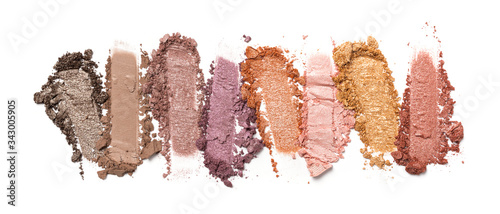 Close-up of make-up swatch. Smear of crushed multicolored set eye shadow