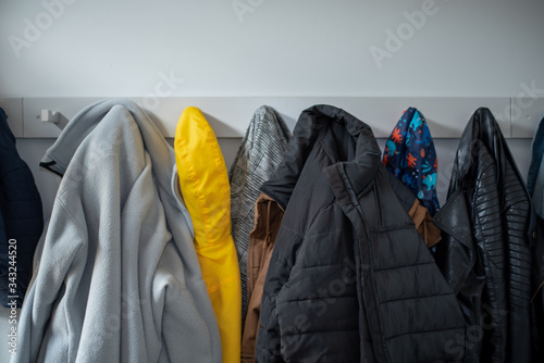 jackets hanging on the wall