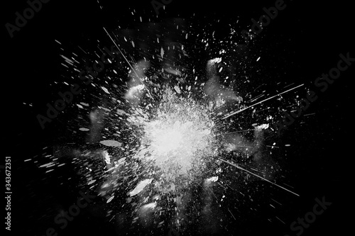 Freeze motion of white powder exploding shatter splatter