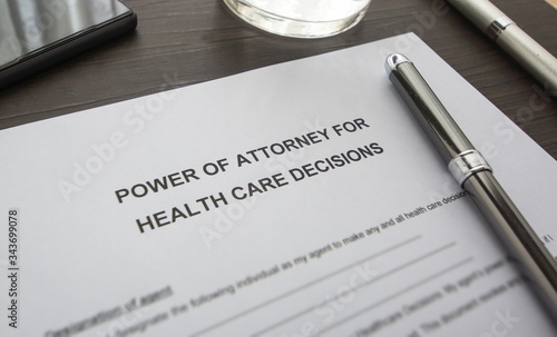 A power of attorney on the table. A document on the desk. power of attorney for health care.
