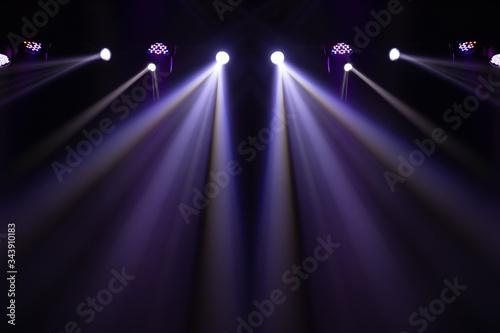 Theater lights spotlights over the stage, texture background for design.