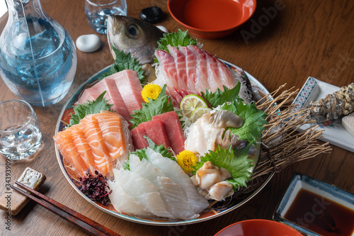 authentic japanese sashimi platter with sake