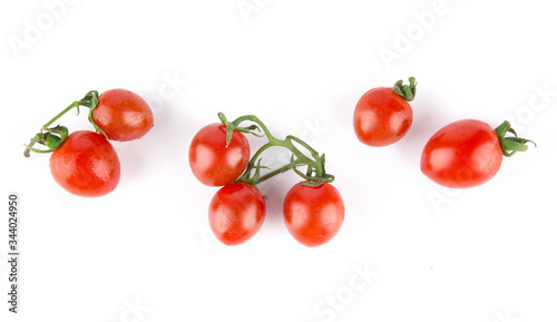 Fresh cherry tomatoes isolated on white background.