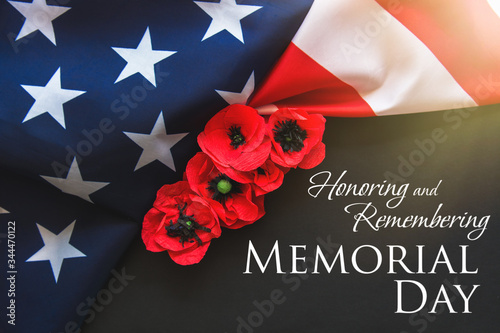 American flag and a poppy flowers with Memorial Day Remember and Honor text background 