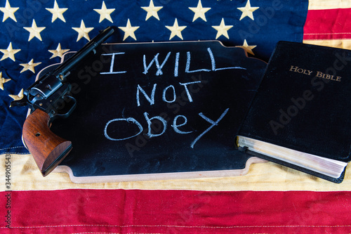 Still life I will not obey on chalkboard with American flag