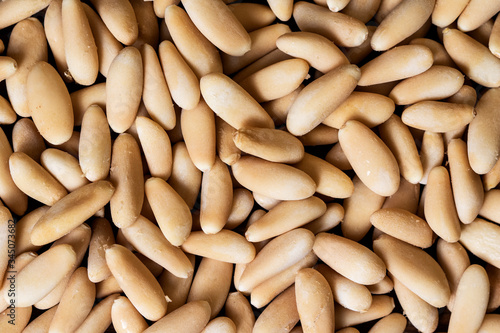Close-up of the texture of the shelled pine nuts.