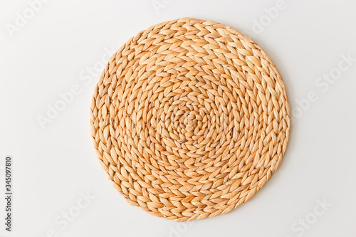 Wicker straw stand isolated on white background. Flat lay, top view minimal social media template