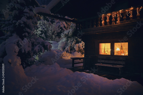 Mountain hut at nightie the snow,Berghütte bei Nacht im Schnee