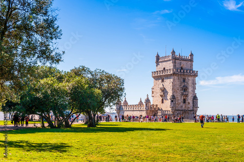 The Tower of Belem with tourists in Lisbon in Portugal