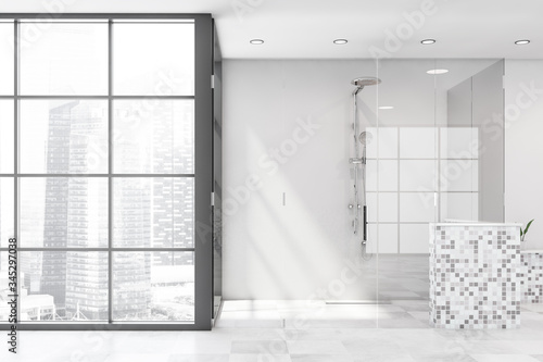 White mosaic bathroom interior with shower
