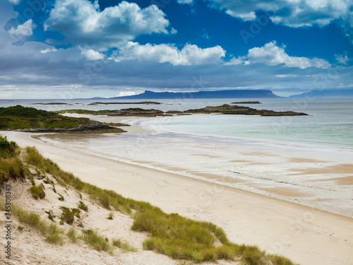 With the islands of Eigg and Rum on the horizon, a view across Camusdarach Beach on the west coast of Scotland - the beach featured in the film Local Hero