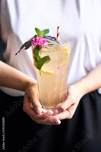 Woman holding lemonade