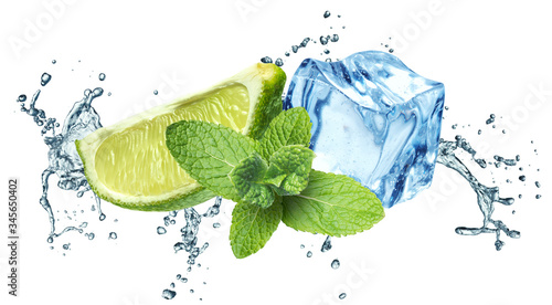 Ice cubes, mint leaves, water splash and lime on a white