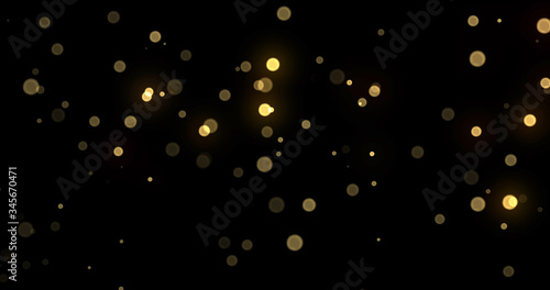 Light bokeh gold shine glitter background, abstract blur. Golden yellow glitter particle flares effect. Bright glowing shiny light bokeh sparkles on black background