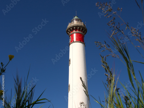 Lighthouse on a background of blue sky, Ouistreham, France