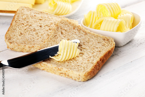 Toasted bread with fresh butter curls. margarine or spread, natural dairy product on breakfast bread