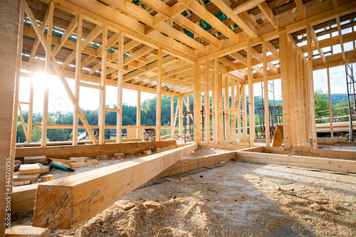 Interior frame of new wooden house under construction