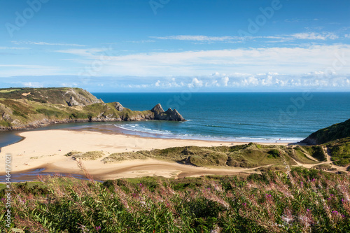 Three Cliffs Bay on the Gower Peninsular West Glamorgan Wales which is a popular Welsh coastline attraction travel destination of outstanding beauty in the UK