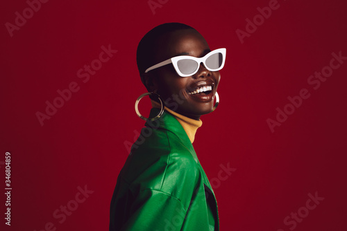 Beautiful woman wearing stylish sunglasses