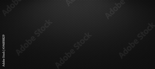 Vector carbon fiber texture. Dark background with lighting.