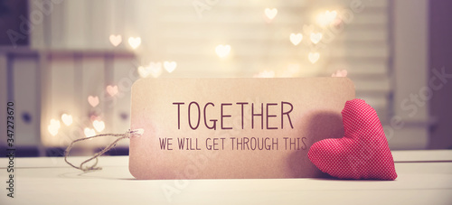 Together We Will Get Through This message with a red heart with heart shaped lights