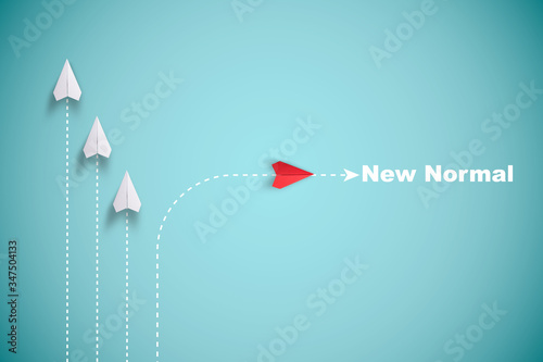 Red paper plane out of line with white paper to change disrupt and finding new normal way on blue background. Lift and business creativity new idea to discovery innovation technology.