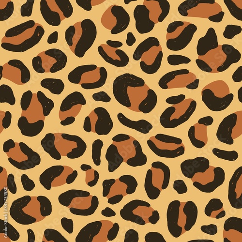 Colorful leopard animalistic seamless pattern. Predator decorative coat texture vector flat illustration. African elegant design. Luxury exotic trendy wrapping paper, textile print or wallpaper