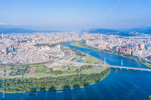 Taipei City Aerial View - Asia business concept image, panoramic modern cityscape building bird’s eye view under daytime and blue sky, shot in Taipei, Taiwan.