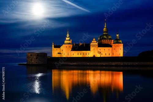 Kalmar, Sweden The grounds of the Kalmar Castle at night and moonrise.
