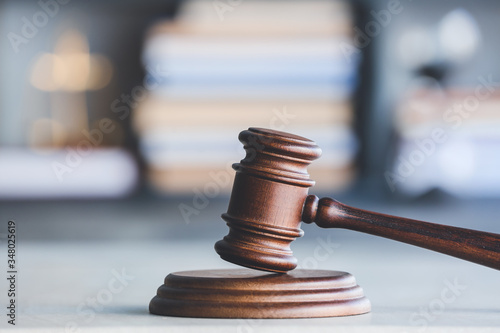 Judge's gavel on table in office