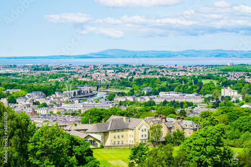 The cityscape of Lancaster, with Morecambe Bay viewed from the Ashton Memorial in Williamson Park.