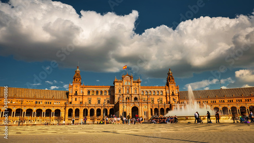Seville, Spain - February 18th, 2020 - Seville 's beautiful Spain Square / Plaza de Espana with the Vicente Traver fountain in the front in Seville City, Spain.