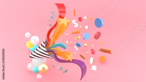 Party popper amidst the like buttons, coins, stars, ribbons among colorful balls on a pink background.-3d rendering..