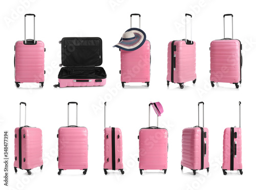 Set of pink suitcases on white background