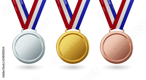 Vector gold medal with ribbon, set of isolated awards in realistic design. Symbol of victory and sporting achievements. Celebration and ceremony concept.