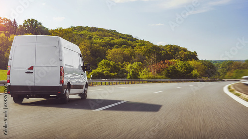 fast vans traveling on the highway