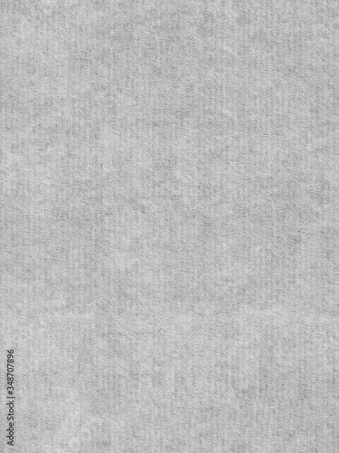High resolution seamless gray cardboard background and texture hard paper sheet. Gray recycled eco carton or paperboard or seamless carton background.