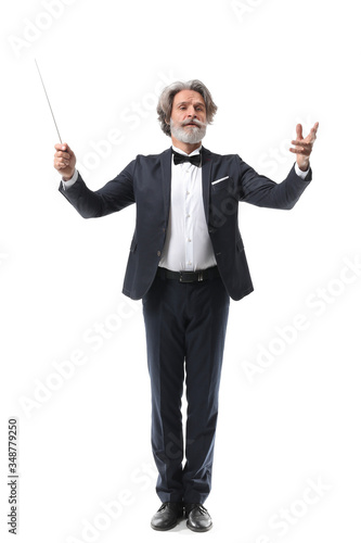 Senior male conductor on white background