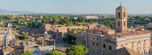 Aetial view to the tower of the Campidoglio and ruins of Basilica Julia and Roman Forum, Rome, Italy.