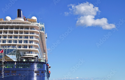 TUI Cruises cruiseship or cruise ship liner Mein Schiff 4 during dream vacation on Caribbean cruising with blue sky and white fluffy clouds