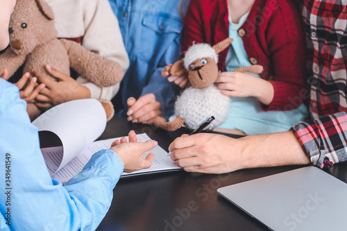 Social worker meeting with couple for signing adoption documents