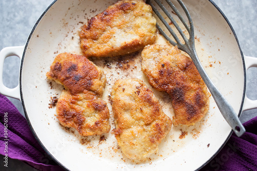 Kotlet schabowy - fried polish bread crumbs coated pork chops 