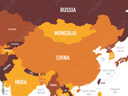China map - brown orange hue colored on dark background. High detailed political map of China and neighboring countries with country, ocean and sea names labeling