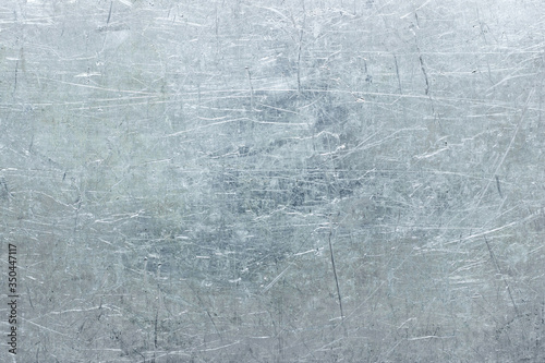 Light metal texture, background of crumpled aluminum sheet or stainless steel